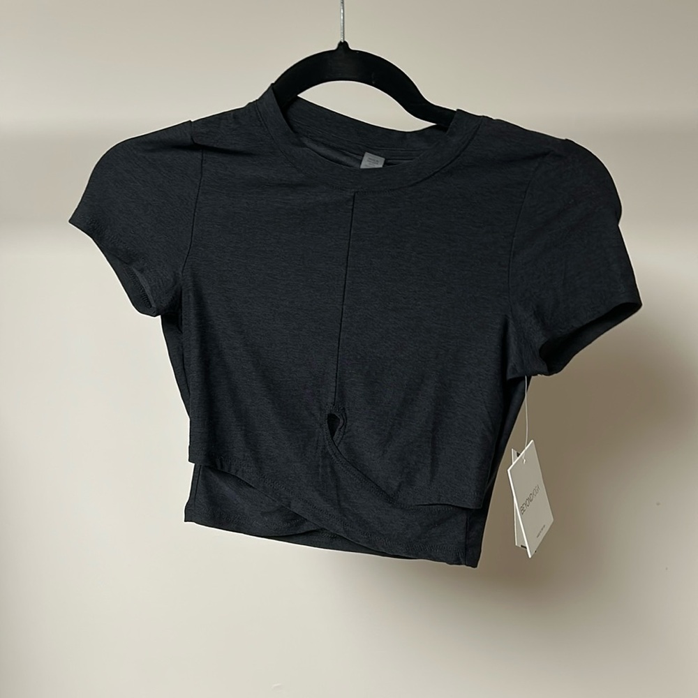 Beyond yoga under over cropped tee dark night